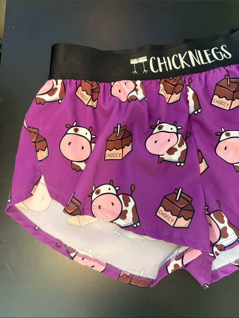 Chicknlegs Women's Purple Cow Print Athletic Shorts - Picture 3 of 9